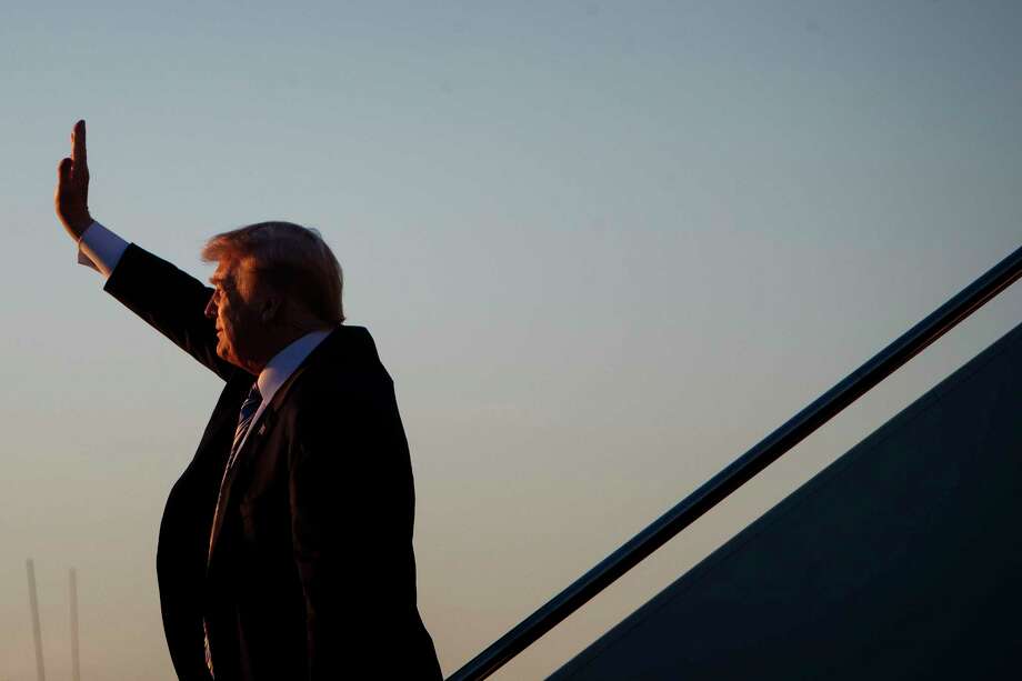 President Donald Trump arrives aboard Air Force One, at Palm Beach International Airport in West Palm Beach, Fla., March 23, 2018. As Trump headed to his Mar-a-Lago resort after a particularly tumultuous week, officials at the White House and in Congress were equally mystified about what might come next. (Tom Brenner/The New York Times) Photo: TOM BRENNER / NYTNS