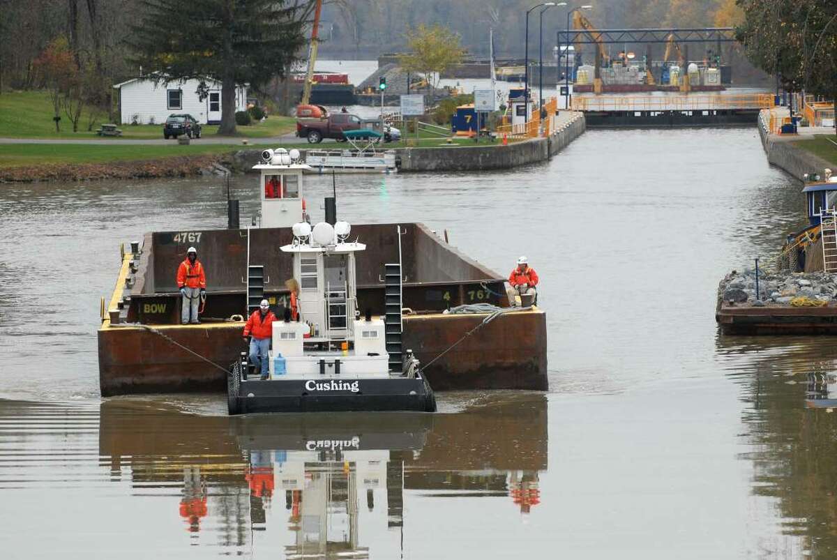 Dredging operations on the Hudson River in Fort Edward slow Tuesday as workers backfill areas that had been cleared of sediment containing PCBs. (Paul Buckowski/Times Union)