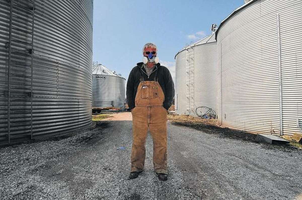 Andy Mason of Lynnville wears a mechanical respirator every time the works in an environment with grain dust. He has had severe reactions to grain dust in the past.