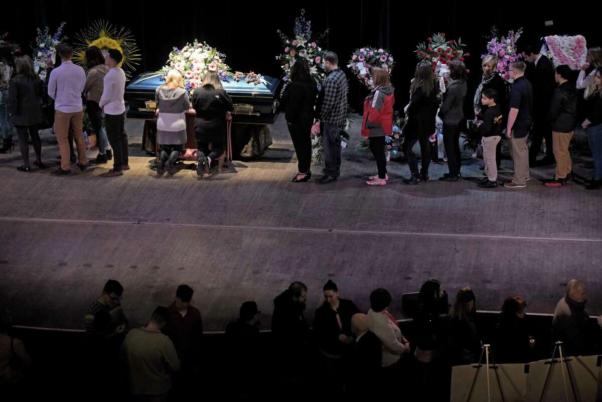 People gather at the Palace Theatre during calling hours for Niko DiNovo on Sunday, March 25, 2018, in Albany, N.Y. (Paul Buckowski/Times Union)