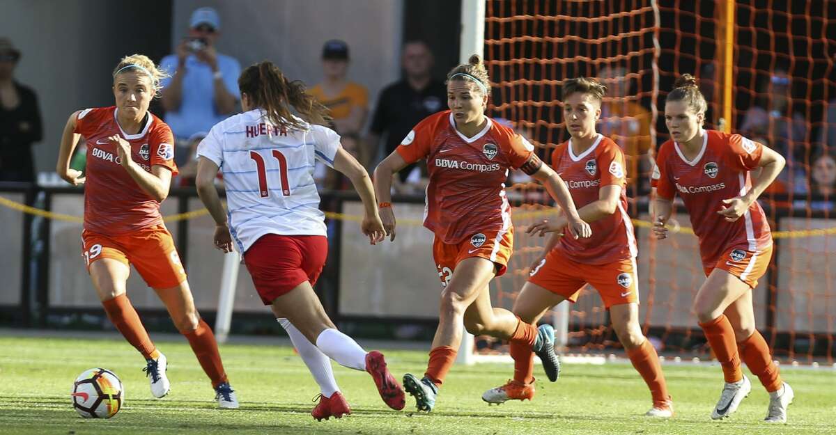 Houston Dash players go up toward Chicago Red Stars forward Sofia Huerta (11) after Huerta's free kick during the second half of the season opener NWSL game at BBVA Stadium on Sunday, March 25, 2018, in Houston. The Houston Dash and the Chicago Red Stars tied at 1-1. ( Yi-Chin Lee / Houston Chronicle )
