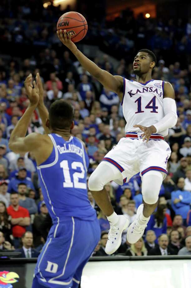 OMAHA, NE - MARCH 25:  Malik Newman #14 of the Kansas Jayhawks shoots the ball against Javin DeLaurier #12 of the Duke Blue Devils during overtime in the 2018 NCAA Men's Basketball Tournament Midwest Regional at CenturyLink Center on March 25, 2018 in Omaha, Nebraska.  (Photo by Streeter Lecka/Getty Images) Photo: Streeter Lecka / 2018 Getty Images