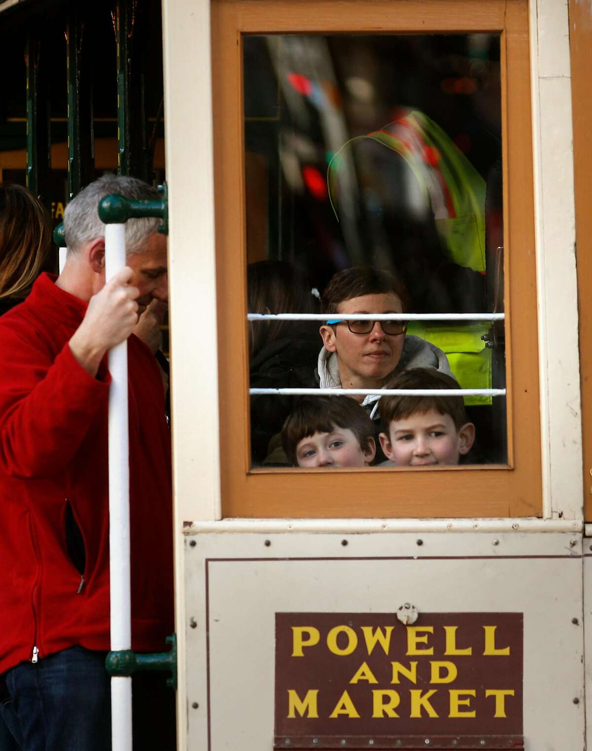 Families ride the world famous cable cars along the Powell st. line in San Francisco, Calif. on Mon. Mar. 26, 2018.