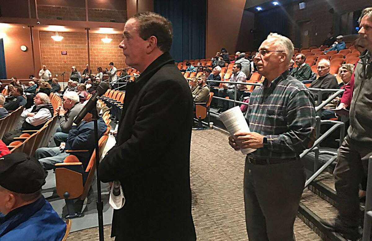 More than a couple dozen residents spoke out Thursday night at Middletown High School after the state Department of Transportation outlined three portions of a five-part project. Here, Common Councilmen Eugene Nocera, left, and Philip Pessina wait to speak.