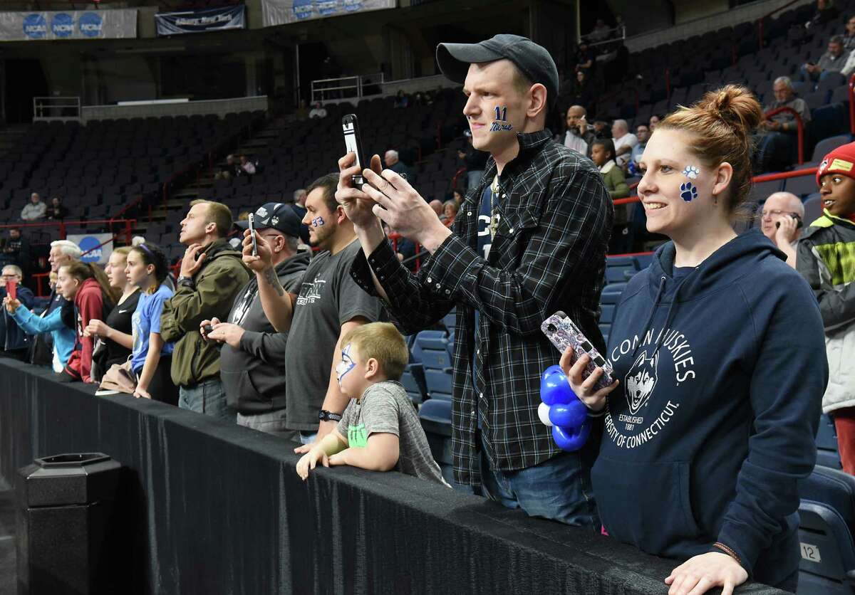 People take photos of UConn practicing with the cameras before the NCAA Women's Basketball regional final between UConn and South Carolina on Monday, March 26, 2018 in Albany, N.Y. (Lori Van Buren/Times Union)