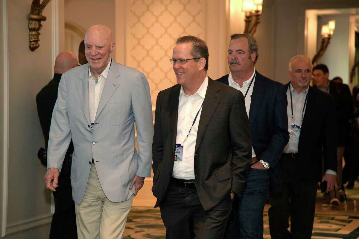 PHOTOS: Bob McNair through the years Houston Texans owner Bob McNair, left, leaves a conference room with his group during the NFL owners meetings, Tuesday, March 27, 2018 in Orlando, Fla. (Phelan M. Ebenhack/AP Images for NFL)