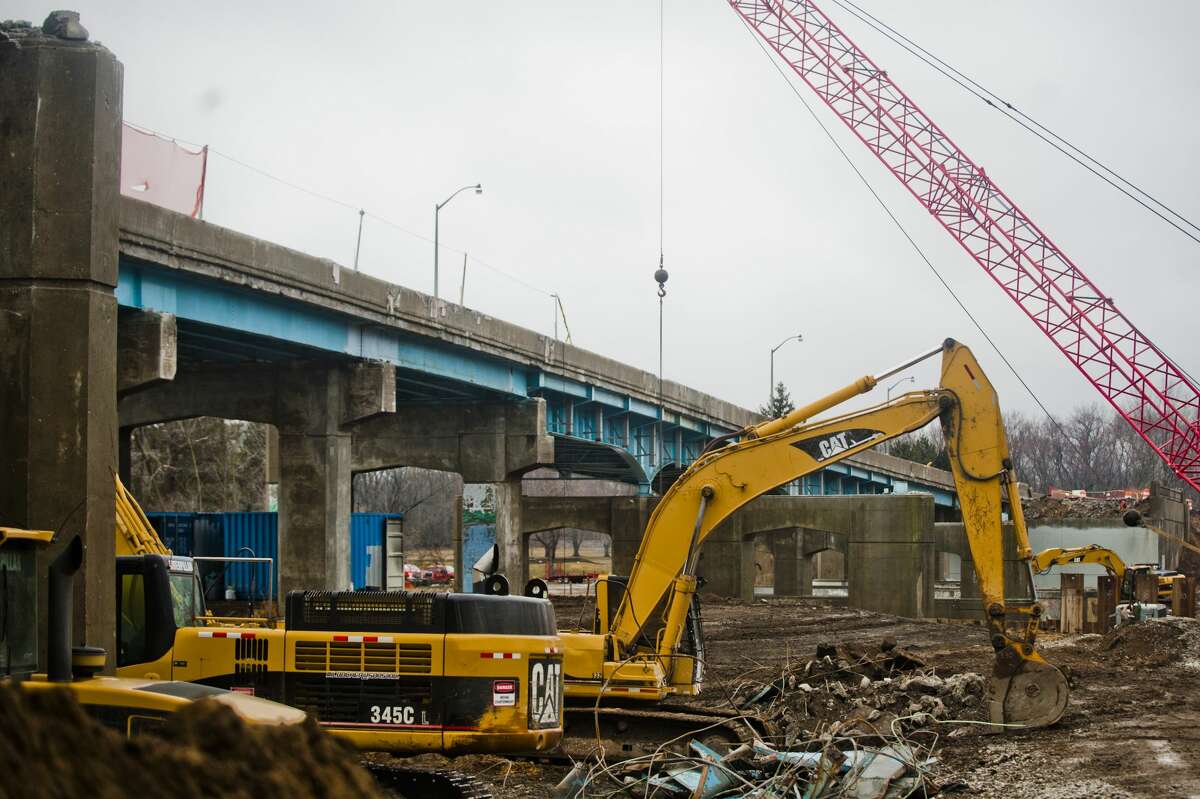 The entire westbound side of the M-20 bridge is gone as construction work continues on Tuesday, March 27, 2018. Traffic has been shifted over to allow for travelers to use the bridge in both directions during the construction. (Katy Kildee/kkildee@mdn.net)