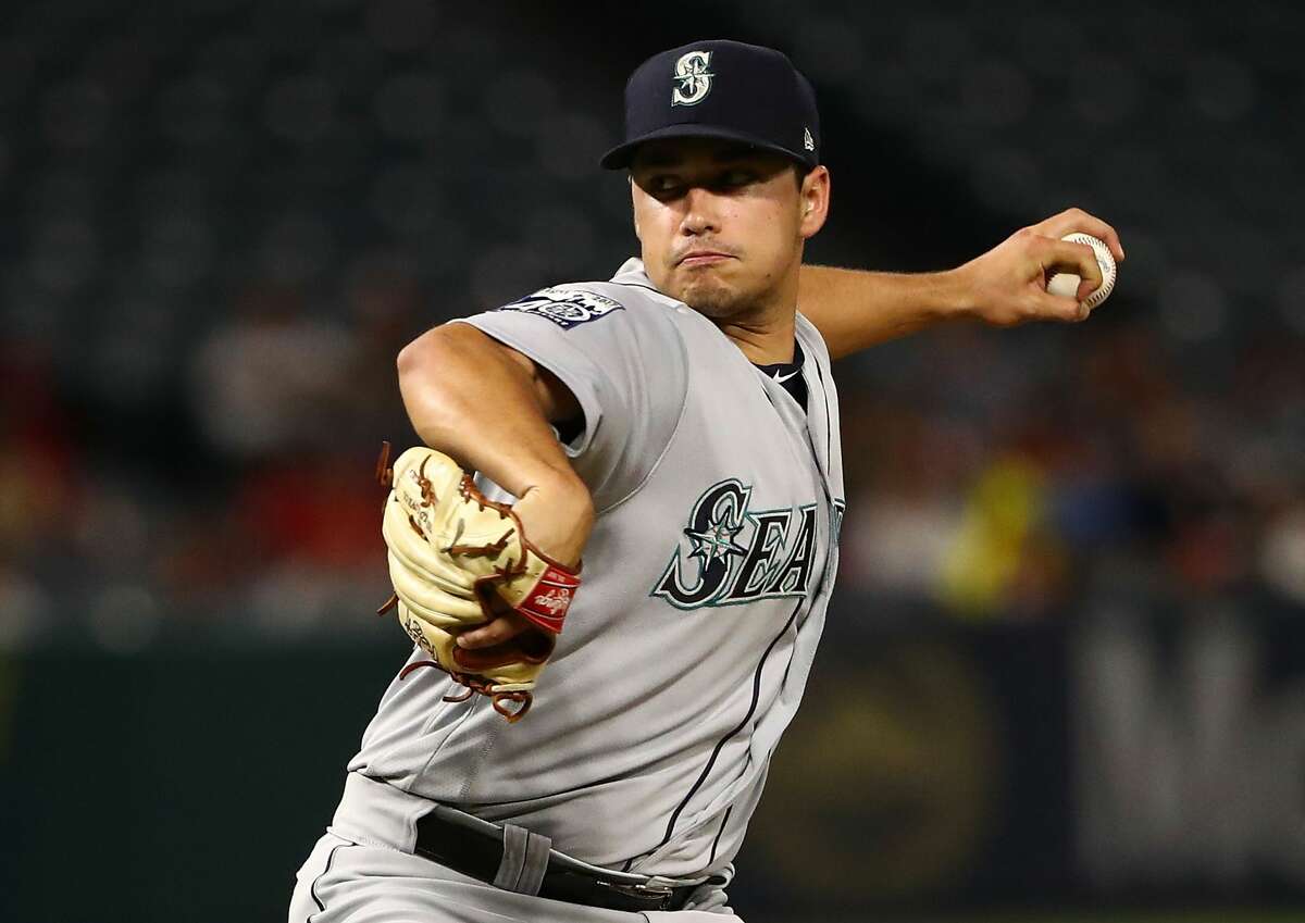 ANAHEIM, CA - SEPTEMBER 29: Pitcher Marco Gonzales #32 of the Seattle Mariners pitches during the first inning of the MLB game against the Los Angeles Angels of Anaheim at Angel Stadium of Anaheim on September 29, 2017 in Anaheim, California. (Photo by Victor Decolongon/Getty Images)