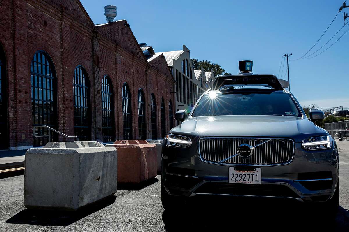 Uber's self driving Volvo XC90 outside the Uber Advanced Technologies Group headquarters at Pier 70, Tuesday, March 6, 2018, in San Francisco, Calif.