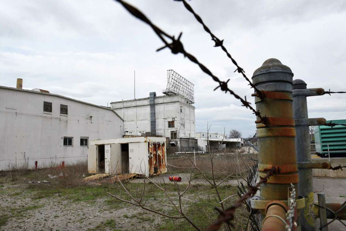 View of the former Beech-Nut plant on Wednesday, April 19, 2017, in Canajoharie, N.Y. EPA contractors are spraying the asbestos contaminated building with a protective encapsulating spray. EPA tests found unsafe levels of asbestos in piles of demolition debris and on portions of the exterior and interior of the former food plant. (Will Waldron/Times Union)