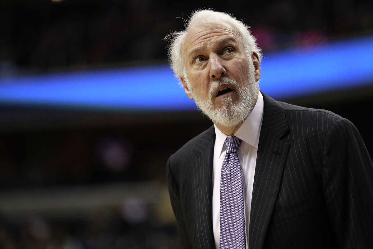 WASHINGTON, DC - MARCH 27: Head coach Gregg Popovich of the San Antonio Spurs looks on against the Washington Wizards during the first half at Capital One Arena on March 27, 2018 in Washington, DC. NOTE TO USER: User expressly acknowledges and agrees that, by downloading and or using this photograph, User is consenting to the terms and conditions of the Getty Images License Agreement.