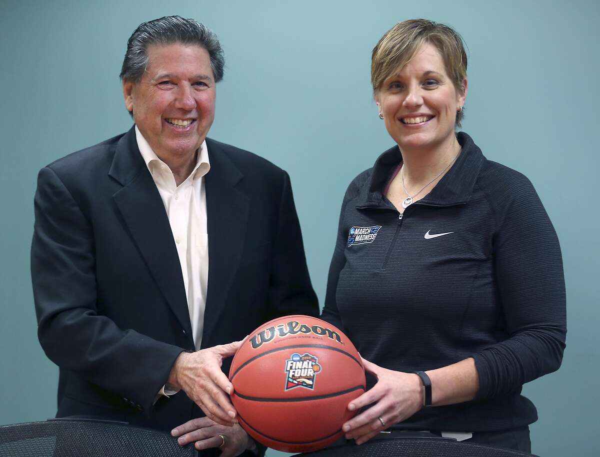 San Antonio Sports President and CEO Russ Bookbinder, left, and SA Sports' Executive Director of the San Antonio Local Organizing Committee for the 2018 Final Four Jenny Carnes pose Wednesday, Feb. 14, 2018 in San Antonio Sports' offices in the Alamodome.