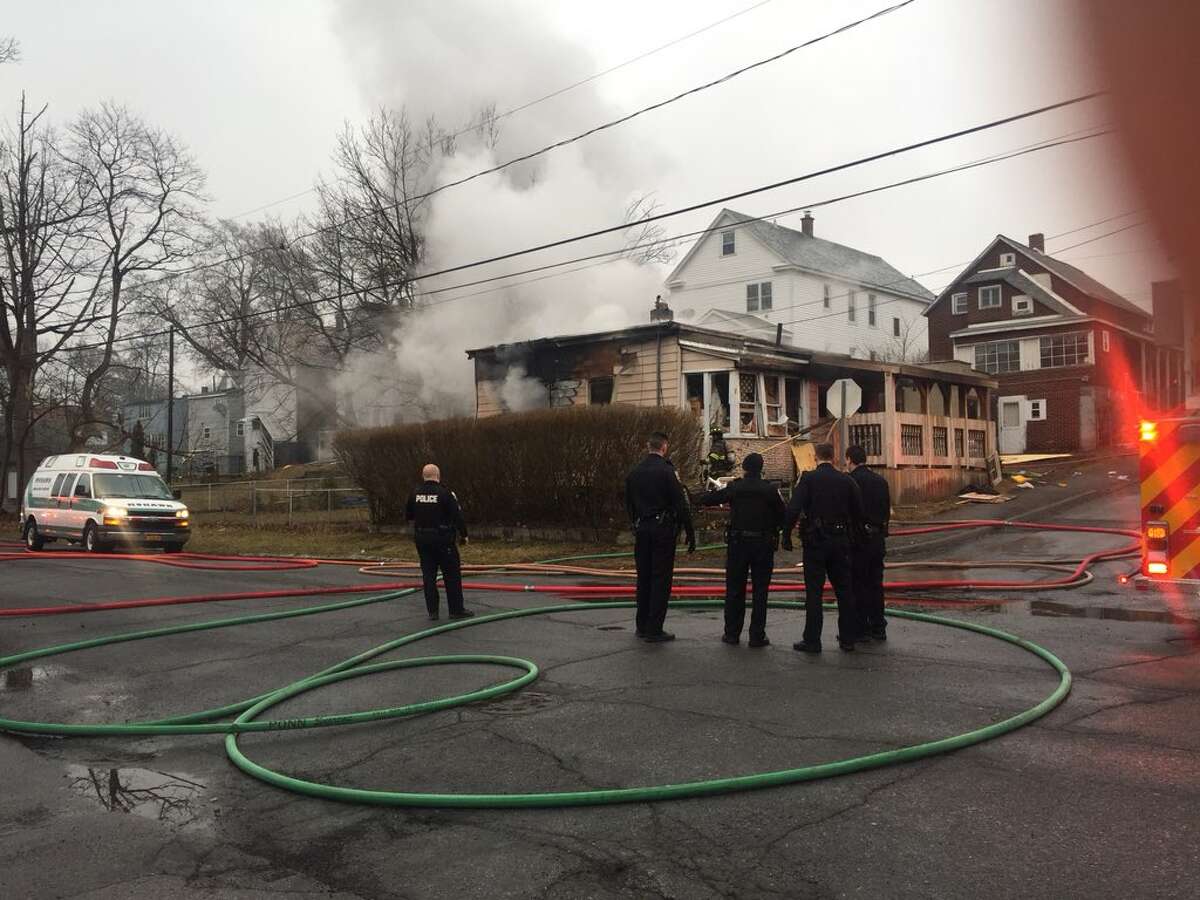Police, neighbors rescue man from Schenectady fire