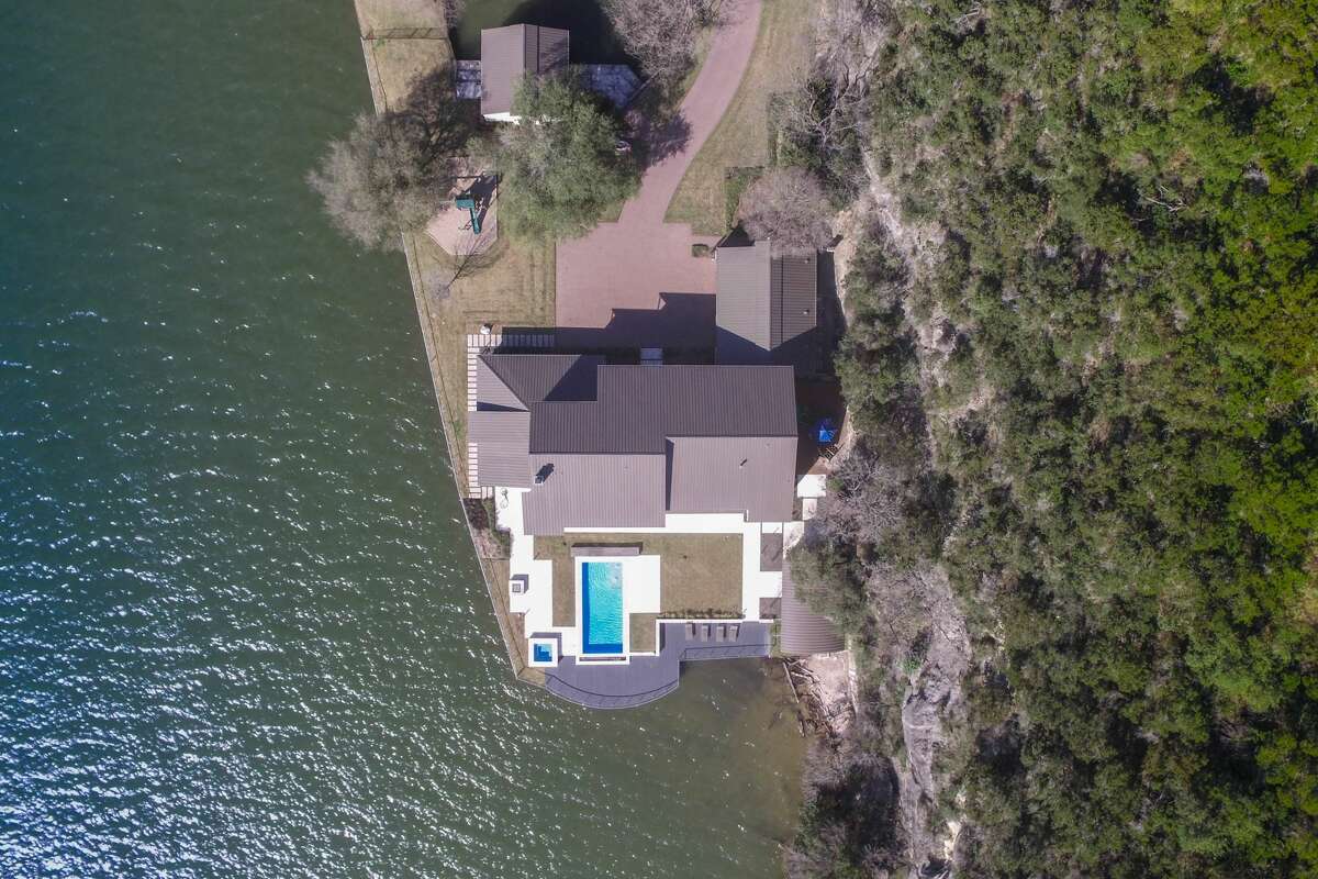 DCIM\100MEDIA\DJI_0307.JPG 3901 Watersedge off of Lake Austin has broken records of being the highest-ever price tag for an Austin MLS residential listing after being sold for $12.3 million. Past record-breakers were ranches with acreage starting at 128 acres.