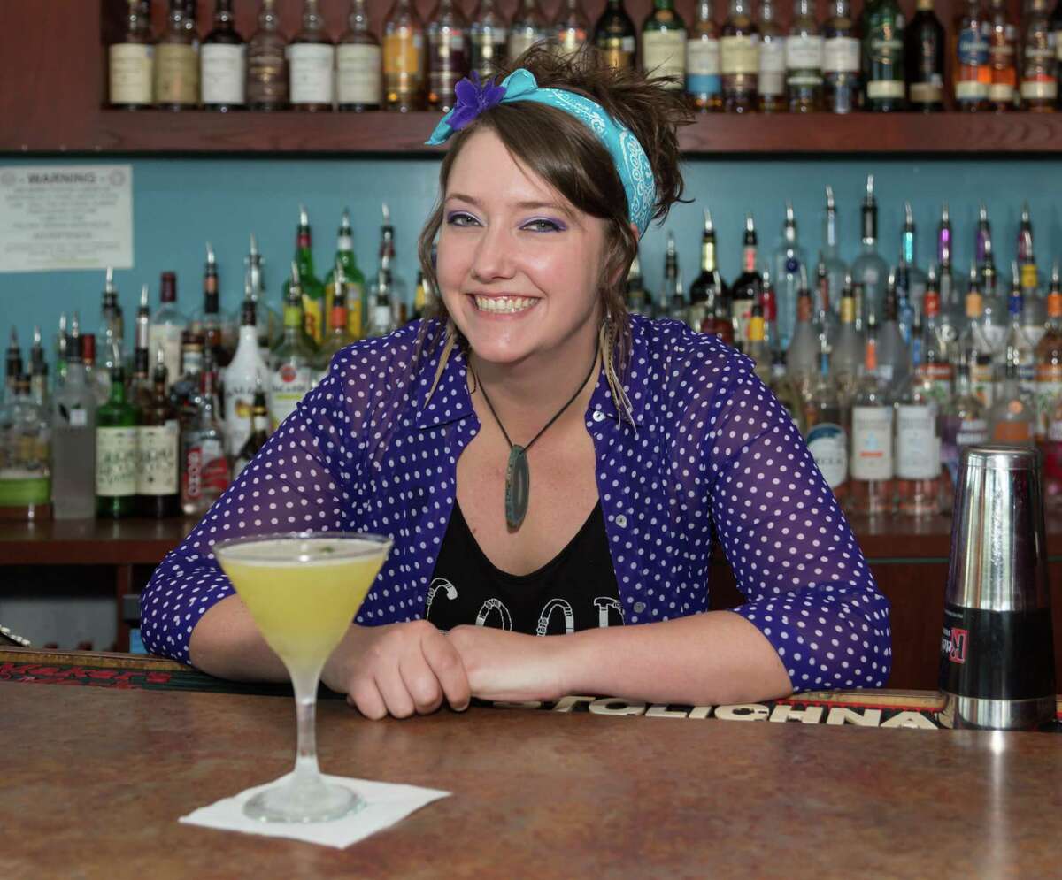 March 8, 2018: Katie Lorkovic mixes a Puerto Rican Donkey punch at The Davenport Lounge in Clear Lake City, south of Houston, Texas. (Leslie Plaza Johnson/Freelance