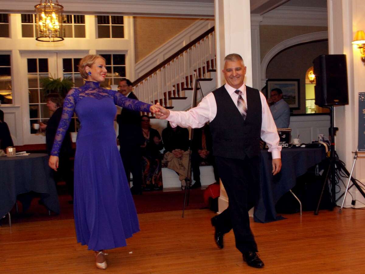 The Bridgeport Hospital Auxiliary will host its annual spring gala, ?“Dancing with the Hospital Stars,?” from 6 to 10 p.m. Friday, April 27, 2018, at Brooklawn Country Club in Fairfield. Pictured -- last year?’s dance contest winner Paul Possenti (right), Bridgeport Hospital director of Trauma, Security, Emergency Preparedness and Emergency Medical Services, with his professional partner Monika.