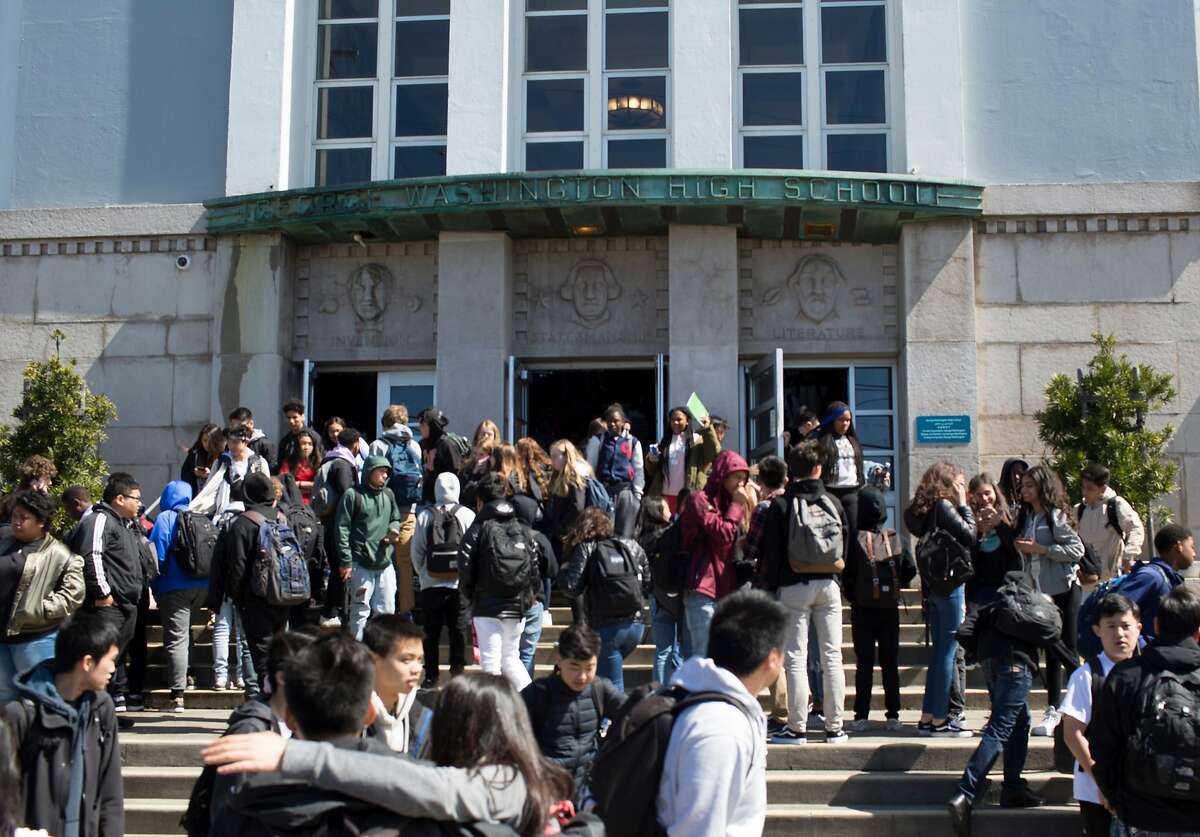 Washington High School students leave the school Thursday afternoon March 22, 2018 at the end of the day in San Francisco, Calif. After a student at Washington High School received straight Fs for all four years, there are questions about why he was permitted to fail for so long.