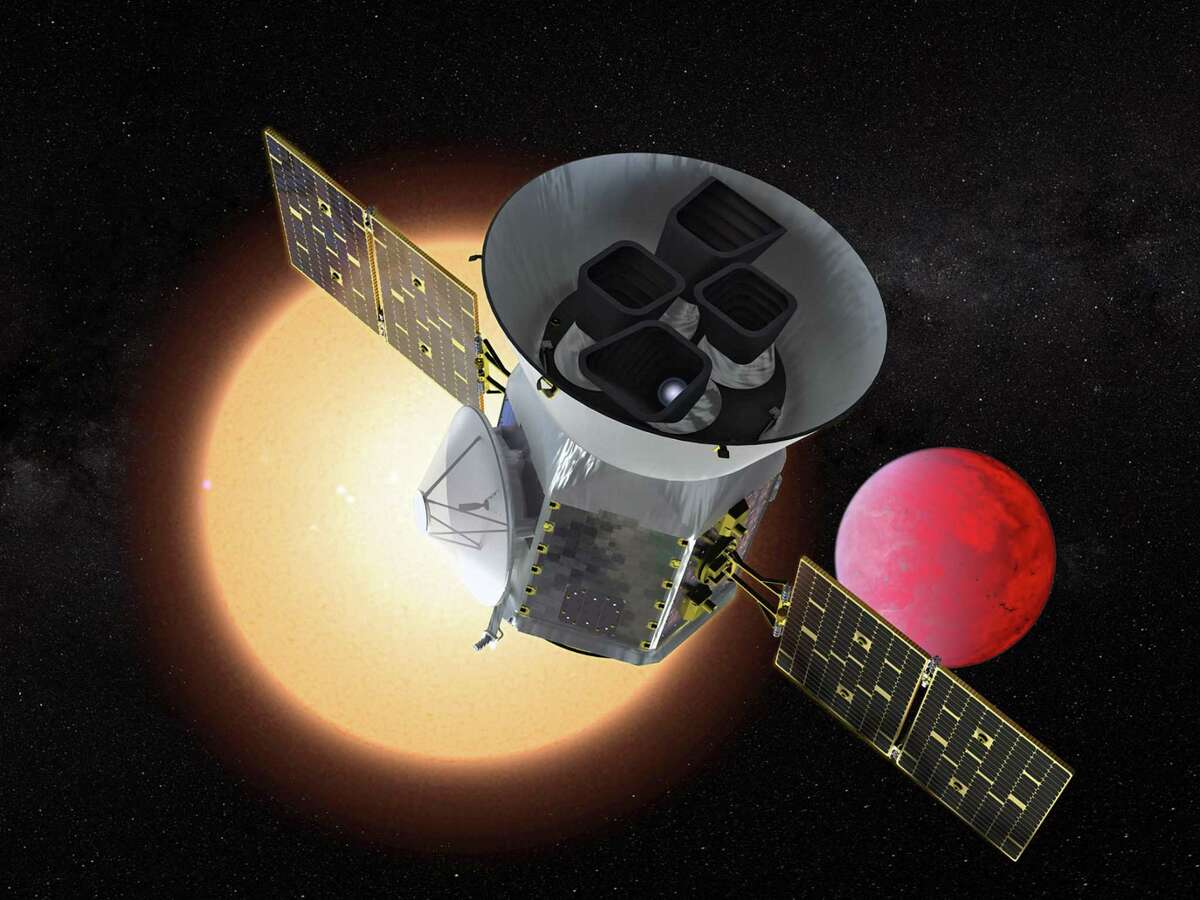 This NASA handout artist's illustration obtained March 25, 2018, shows the Transiting Exoplanet Survey Satellite (TESS), a NASA Explorer mission launching in 2018 to study exoplanets, or planets orbiting stars outside our solar system.