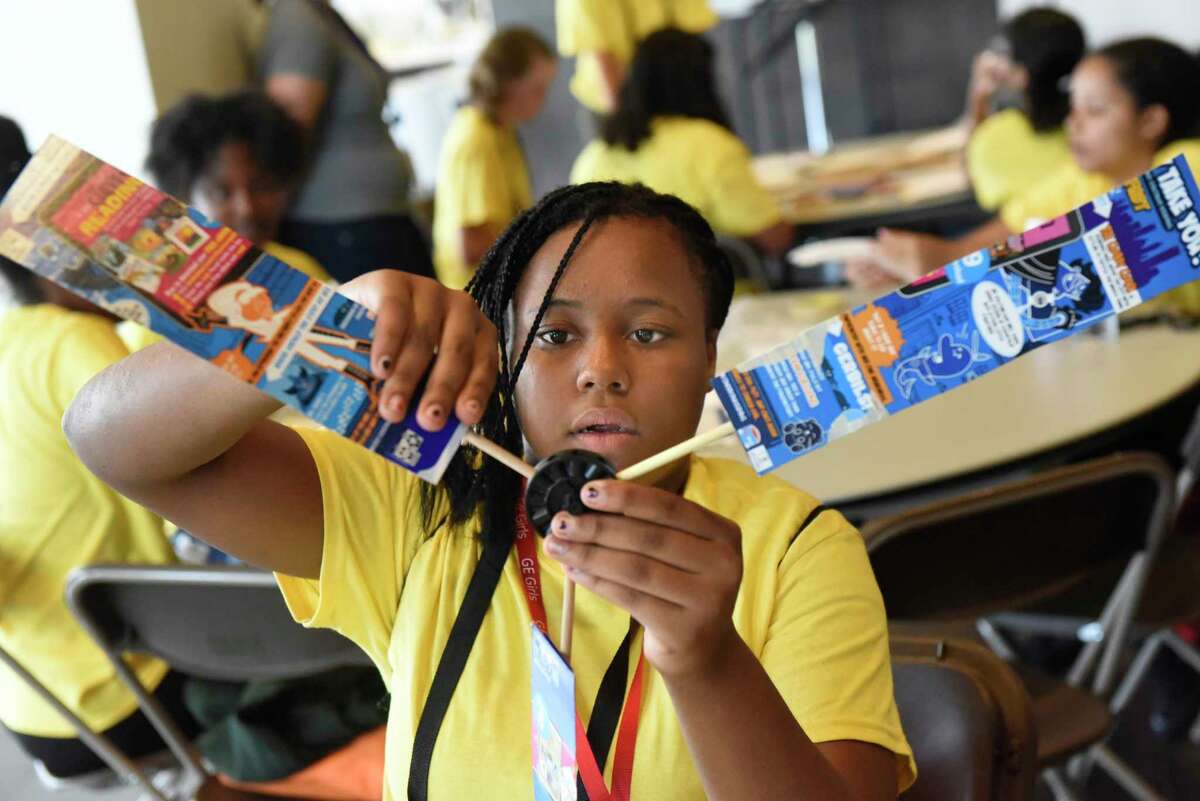 Enid Waring, 13, of Schenectady builds a wind turbine during the 5th annual GE Girls summer STEM experience on Thursday, Aug. 11, 2016, at General Electric in Schenectady, N.Y. (Cindy Schultz / Times Union)