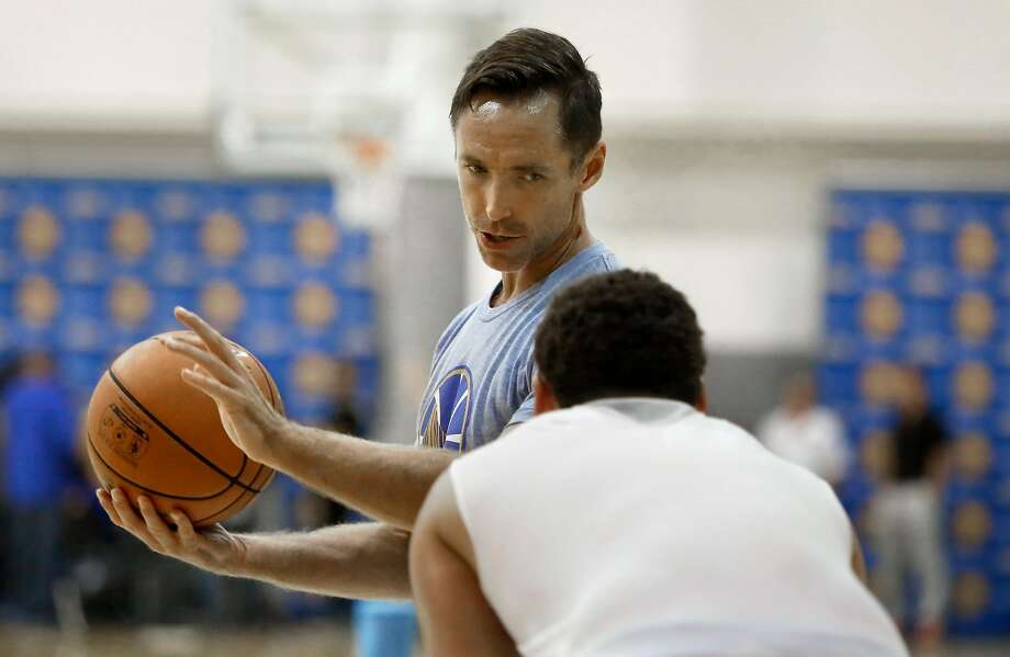Player development consultant Steve Nash works with Warriors guard Klay Thompson at the Warriors gym in Oakland, Calif., on Friday, October 2, 2015. Photo: Liz Hafalia / The Chronicle