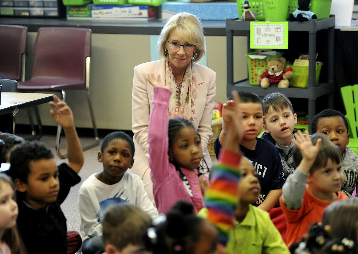 U.S. Secretary of Education Betsy Devos sits in with a class at Greater Johnstown Elementary School in Johnstown, Pa., Monday, March 26, 2018. (John Rucosky/The Tribune-Democrat via AP)
