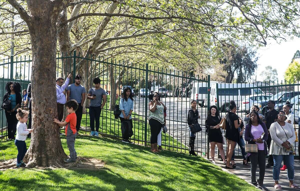 Hundreds of attendees line up outside Bayside of South Sacramento Church Thursday, March 29, 2018 in Sacramento, Calif. ahead of the funeral service for 22-year-old Stephon Clark who was shot and killed by Sacramento Police on March 18.