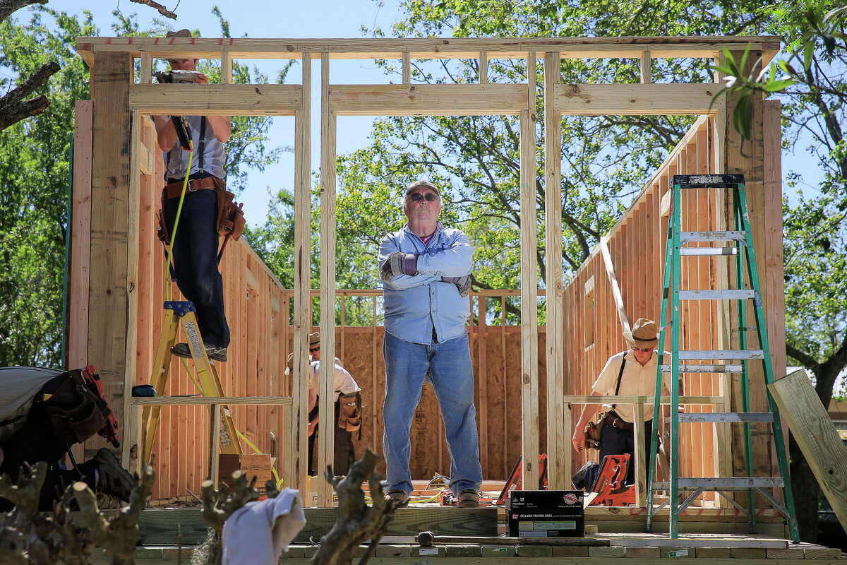 Houston Hero Tommy Overstreet helps build a home for a victim of Hurricane Harvey in Rosharon.