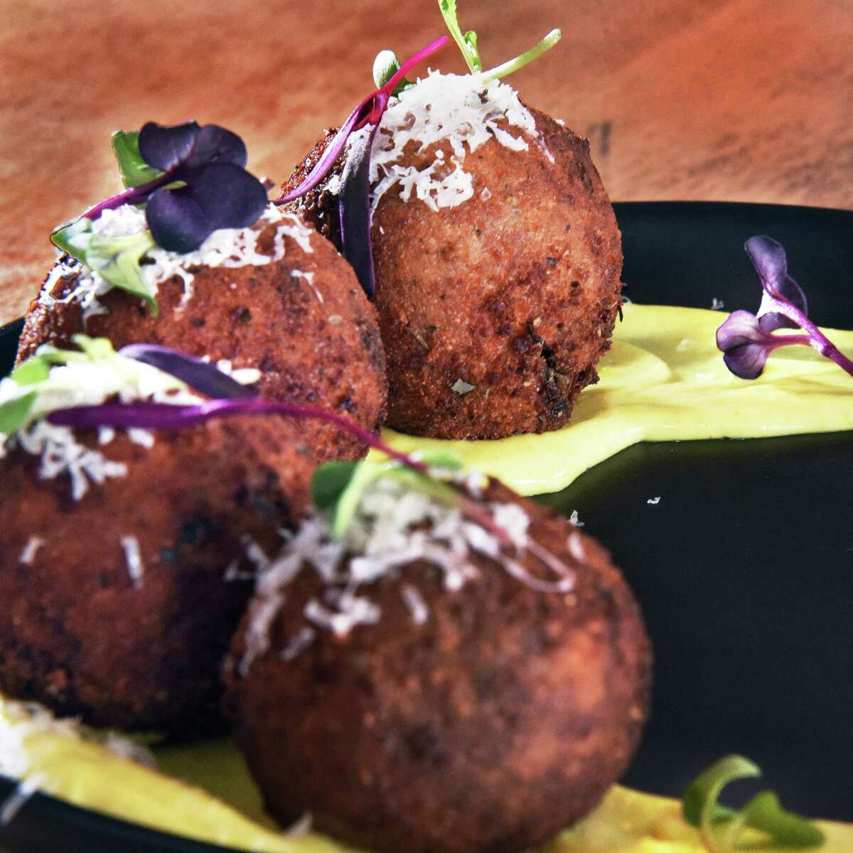 Arancini at Caskade Kitchen & Bar on Remsen Street Wednesday March 21, 2018 in Cohoes, NY. (John Carl D'Annibale/Times Union)