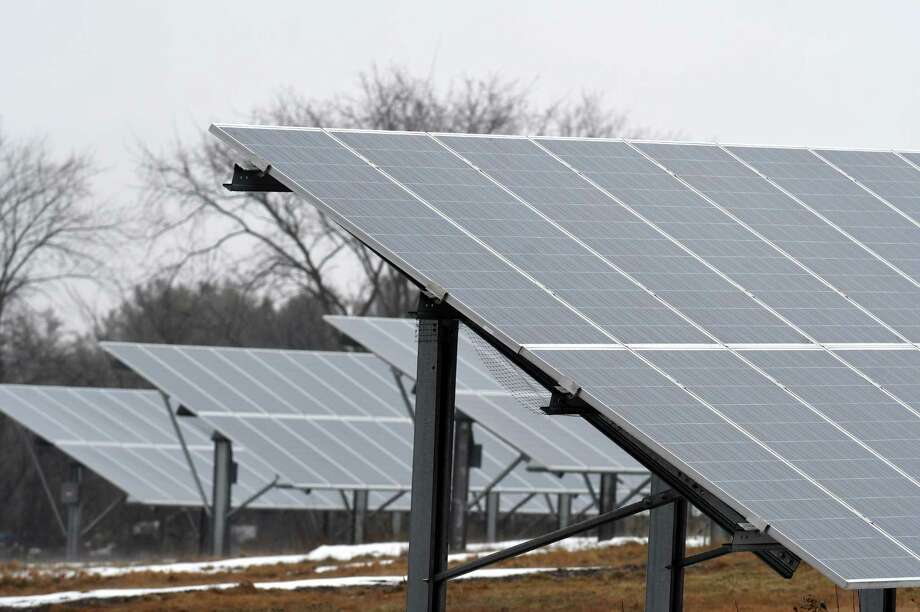 Solar panels in a five-acre field on Route 7 are part of a community solar farm on Thursday, March 29, 2018, in Pittstown, N.Y. The Monolith Solar farm supplies power to support the Albany City School District, with the remaining electricity earmarked for 26 homeowners or apartment dwellers throughout the Capital Region. (Will Waldron/Times Union) Photo: Will Waldron, Albany Times Union