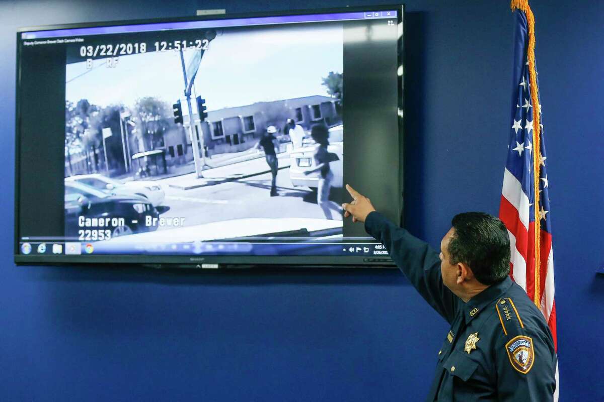 Harris County Sheriff Ed Gonzalez watches dash cam video of the fatal deputy-involved shooting of Danny Ray Thomas during a press conference regarding the shooting Monday, March 26, 2018 in Houston.