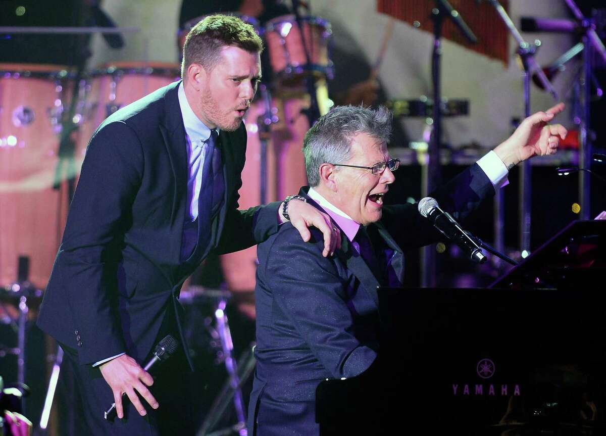 David Foster, right, with Michael Buble. Foster is producing Buble’s next album.