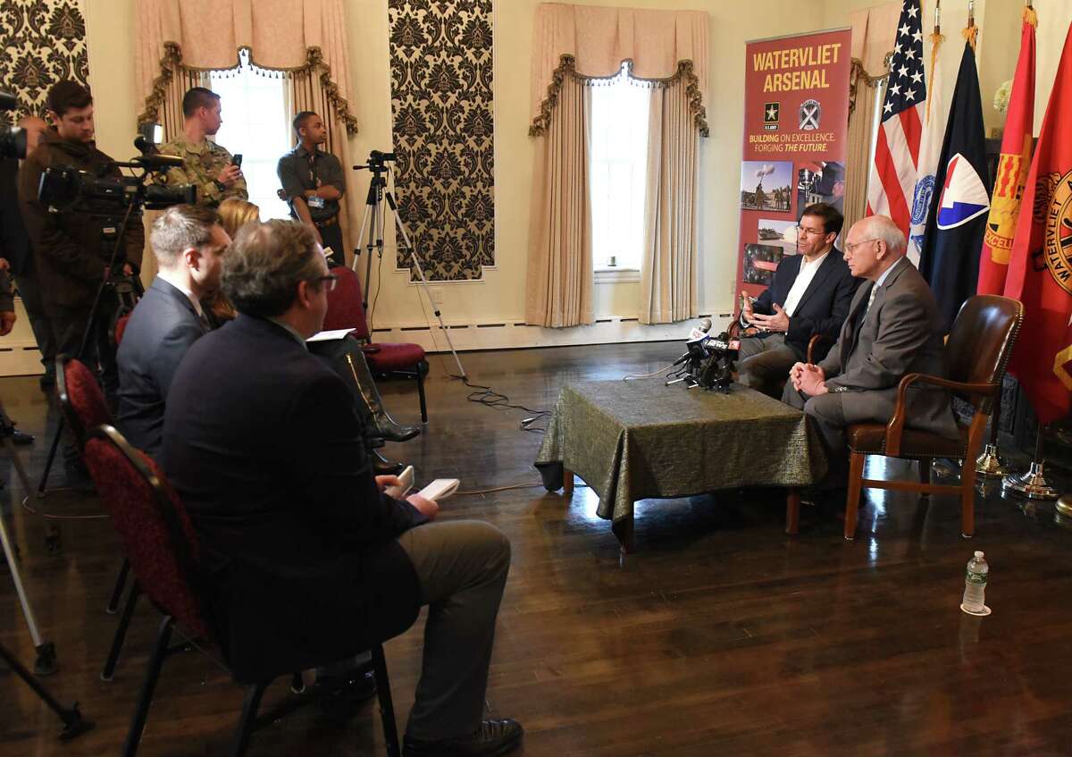 Dr. Mark T. Esper , the Secretary of the Army, left, and Congressman Paul Tonko talk to the press after taking a tour of the Watervliet Arsenal on Friday, March 30, 2018 in Watervliet, N.Y. (Lori Van Buren/Times Union)