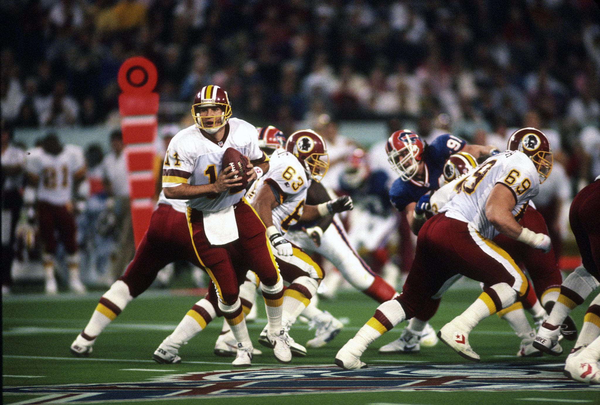 9 Jan 1993: Quarterback Mark Rypien of the Washington Redskins drops back  to pass during the Redskins 20-13 loss to the San Francisco 49ers in an NFC  second round playoff game at