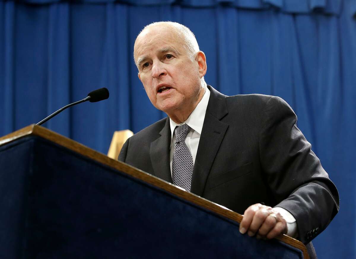 FILE - In this Jan. 10, 2018 file photo, California Gov. Jerry Brown responds to a question at a news conference in Sacramento, Calif. Gov. Brown on Friday, March 30, pardoned five ex-convicts facing deportation, including two whose families fled the Khmer Rouge regime in Cambodia four decades ago. (AP Photo/Rich Pedroncelli, File)