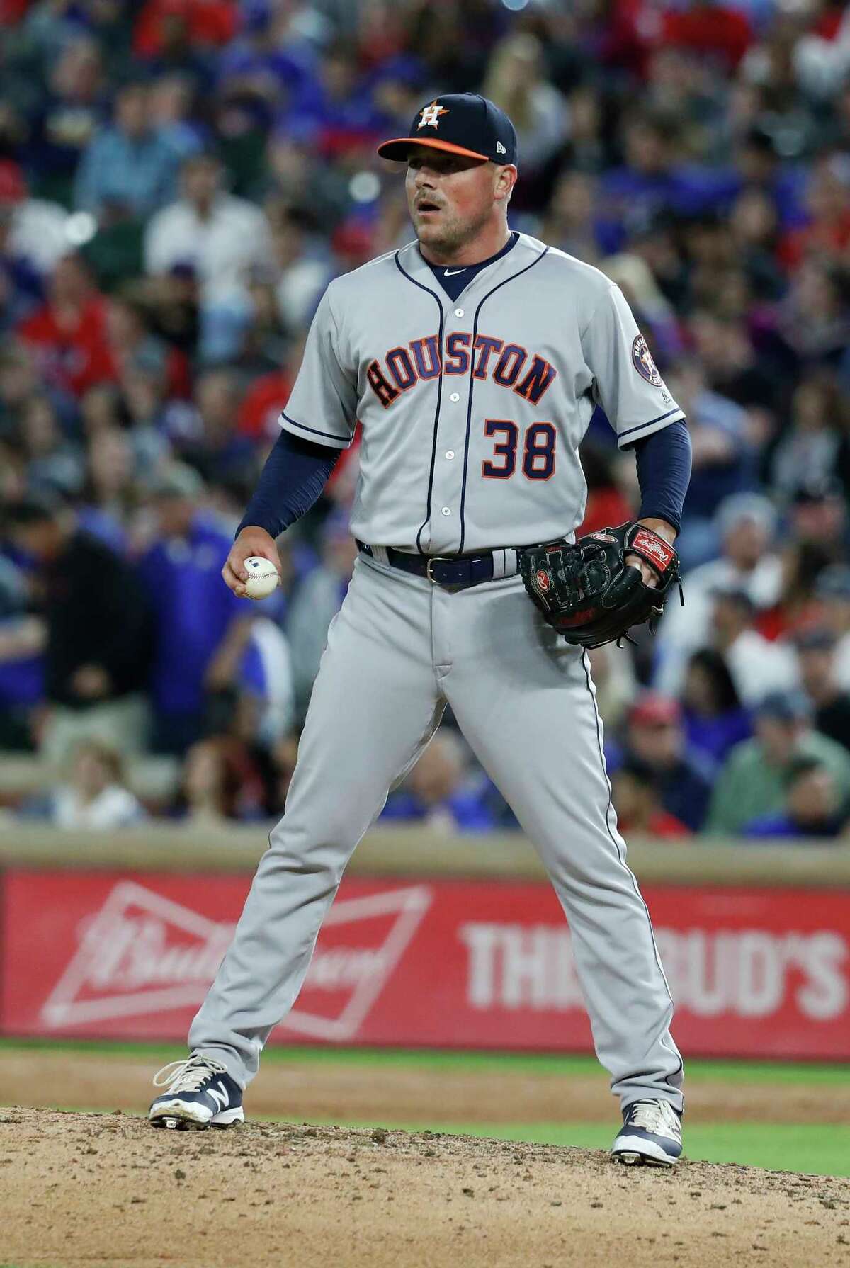 Houston Astros relief pitcher Joe Smith pitches in the seventh inning of an MLB baseball game Globe Life Park, Friday, March 30, 2018, in Arlington.