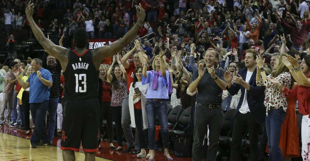 Houston Rockets fans go crazy as James Harden walk toward them after the team's last-second win of the NBA game against the Phoenix Suns at Toyota Center on Friday, March 30, 2018, in Houston. The Houston Rockets defeated the Phoenix Suns 104-103 the last second of the game.( Yi-Chin Lee / Houston Chronicle )