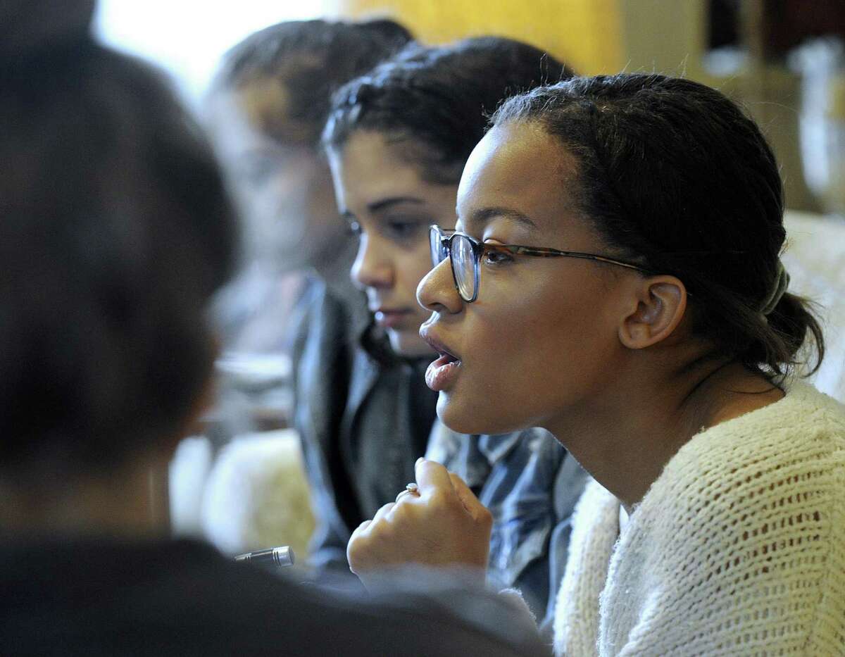 Danielle Johnson, 15, right, is one of a group of Newtown students talking about her role in the growing youth movement calling for stricter gun laws. At center is Jenny Wadhwa, 16.