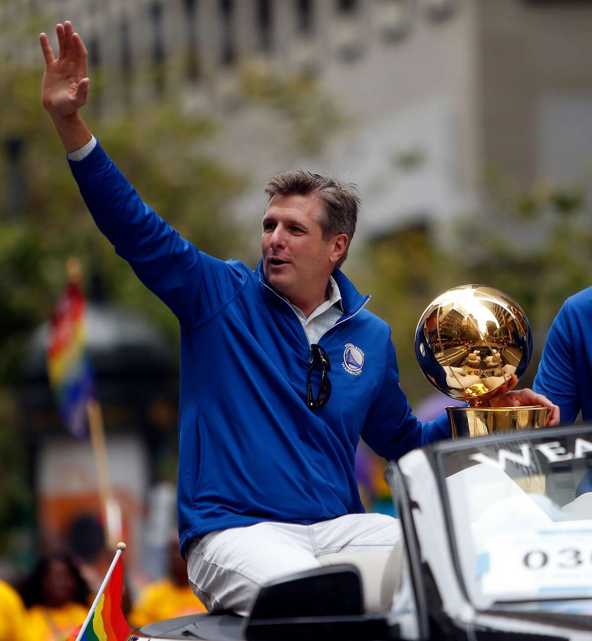 Golden State Warriors' President Rick Welts and the Larry O'Brien Trophy during the "Equality Without Exception" SF Pride Parade down Market Street in San Francisco, Calif., on Sunday, June 28, 2015.
