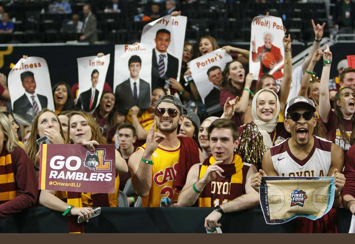 Fans from Loyola Chicago cheer while their team warm-ups on the floor on Saturday, March 31 ,2018 at the Alamodome