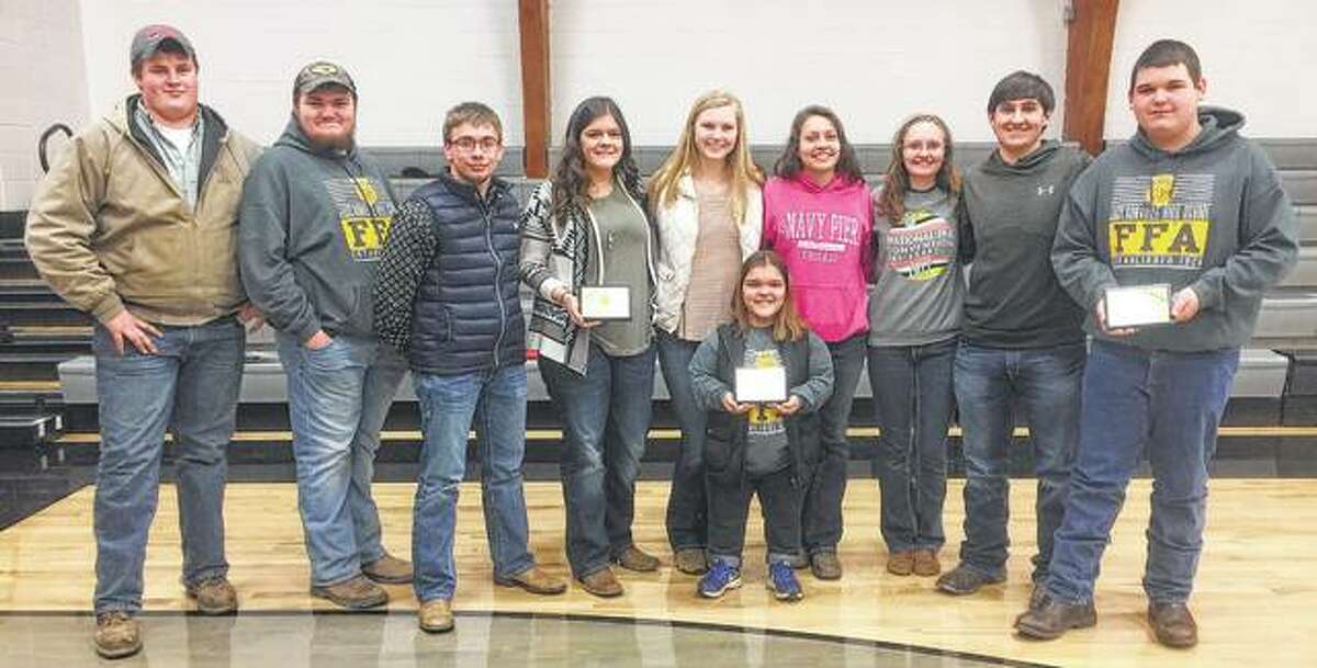 Jacksonville High School FFA’s poultry tream recently placed first in varsity competition. Team members and their individual honors include Austin Dufelmeier (from left); Mike VanGiesen, fifth place; Dalton Bartz, third place; Chasey Tabit, second place; Katie White; Hanah Pullon; Savannah Jibben; Kassidy Upchurch, seventh place; Blake Hadden, sixth place; and Garrett Bruns, first place.