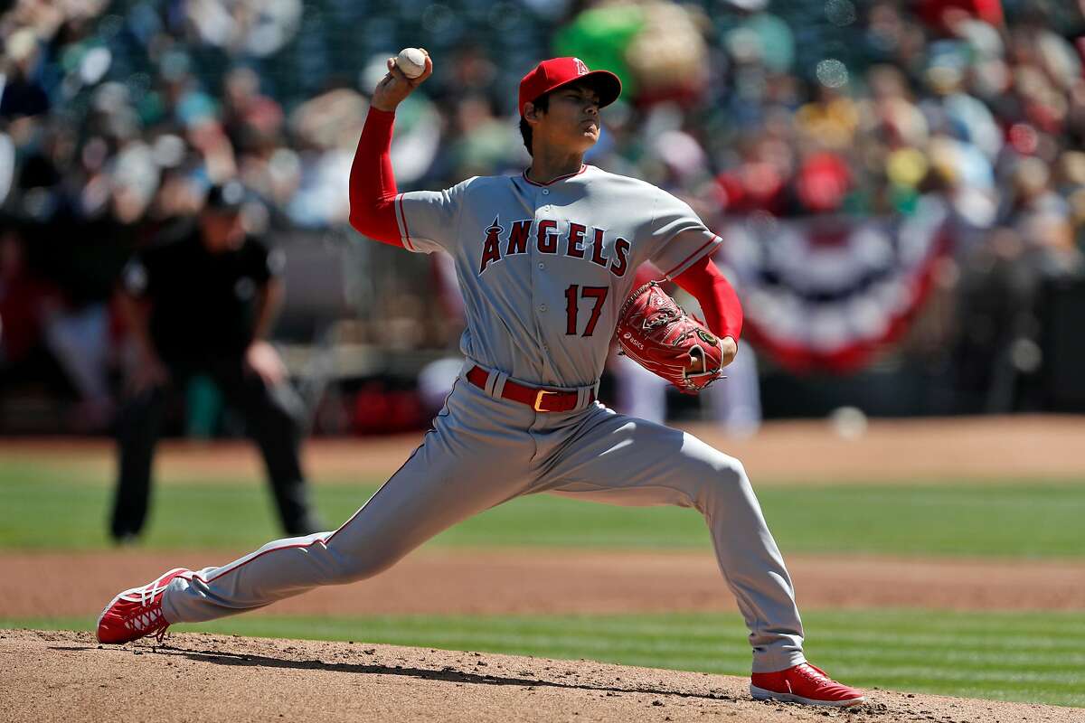 Los Angeles Angels' Shohei Ohtani stretches during a spring