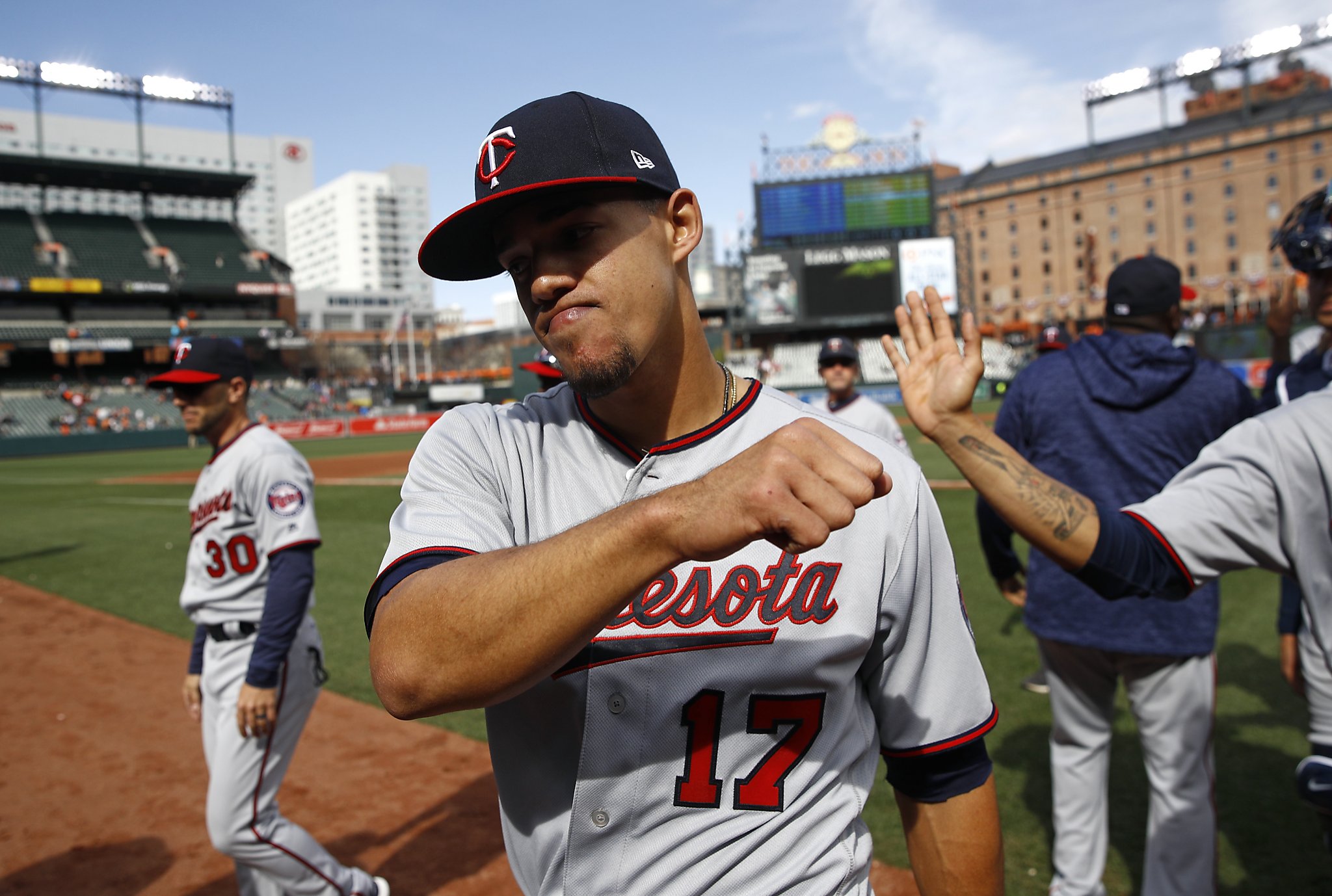 Minnesota Twins' Jose Berrios tips his cap to the crowd as he