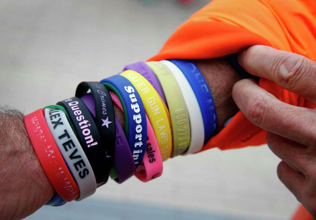 Richard Martinez wears wristbands in memory of gunshot victims during a march against gun violence across the Golden Gate Bridge in San Francisco last year.