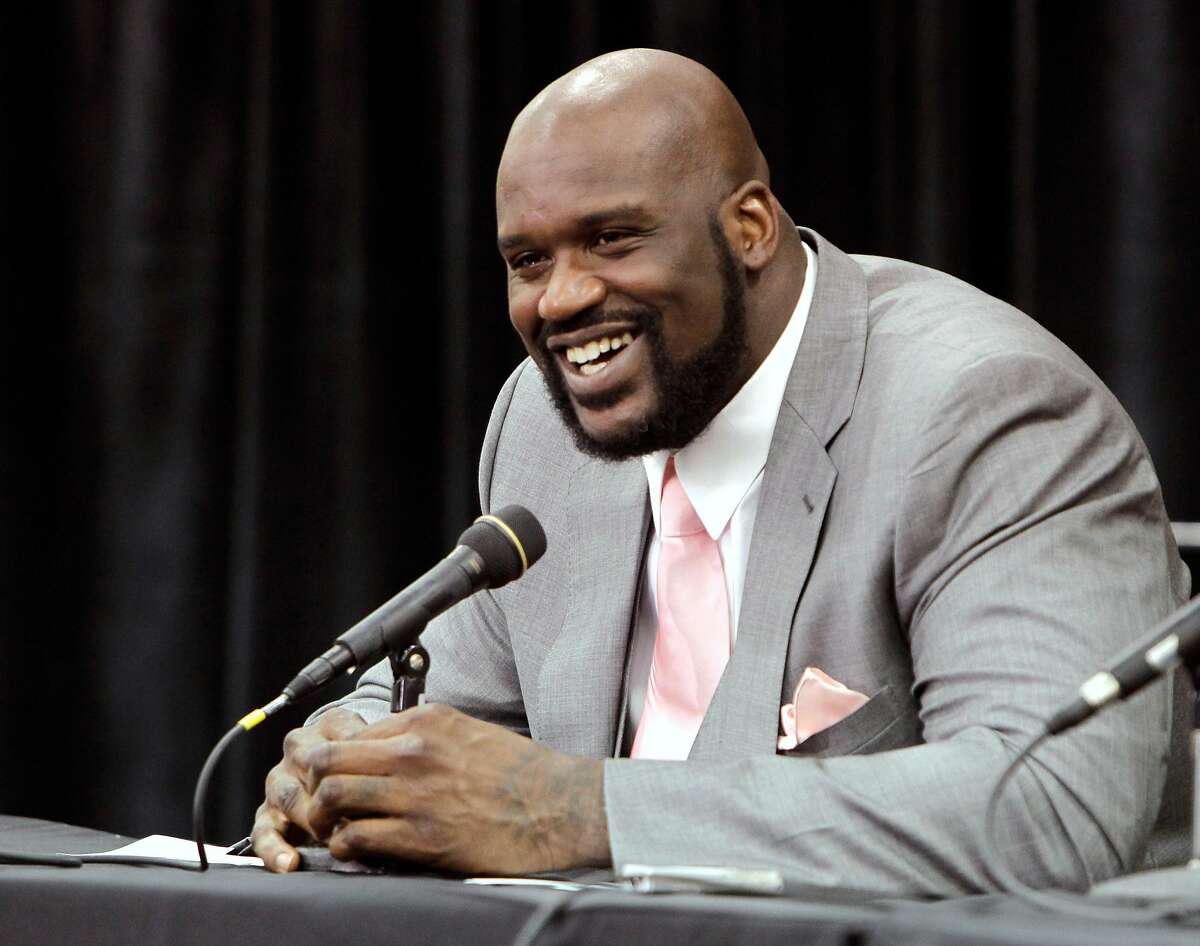 FILE - This June 3, 2011, file photo shows Shaquille O'Neal announcing his retirement from NBA basketball at his home in Windermere, Fla. O'Neal has agreed to a multiyear deal with Turner Sports to become an analyst on its NBA coverage. O'Neal, who retired last month, will join TNT's studio show with Charles Barkley, Kenny Smith and Ernie Johnson. He also will contribute to NBA TV and NBA.com. The agreement announced Thursday, July 14, 2011, includes a development deal with Turner's entertainment and animation networks.