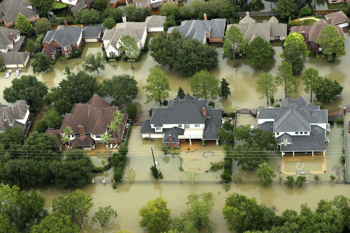 Floodwaters from the Addicks Reservoir inundate a neighborhood off N. Eldridge Parkway in Houston in the aftermath of Hurricane Harvey on Aug. 30, 2017.
