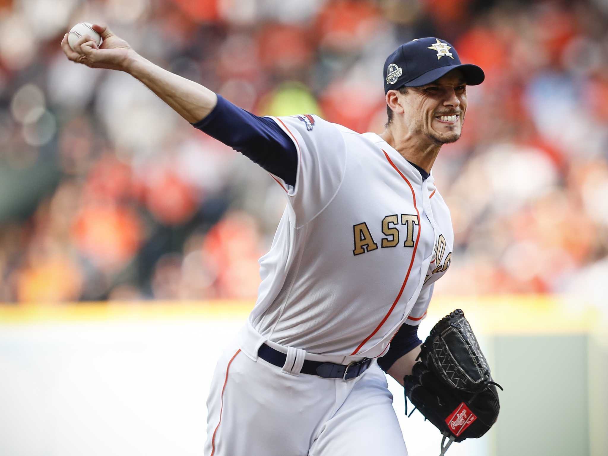 Alex Cora makes good on bet with Alex Bregman, dons LSU jersey