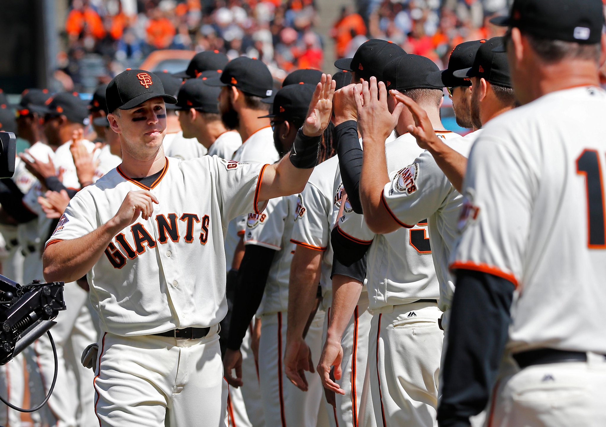 San Francisco Giants Brian Wilson (38) celebrates by jumping up on