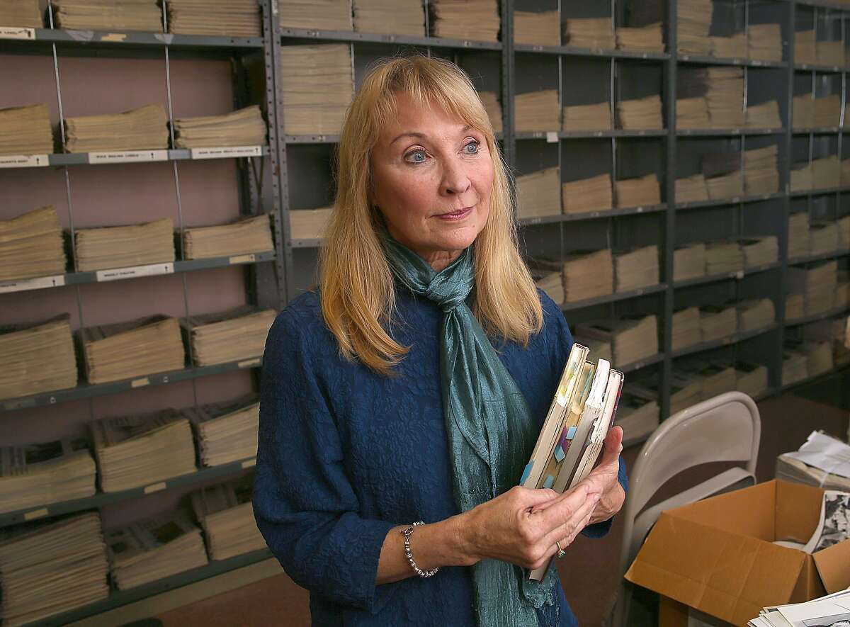 Actor and playwright Lorri Holt, who originated the role of Harper Pitt in Tony Kushner's "Angels in America" holds on to her journals as she gets ready to do a podcast at The Chronicle. 