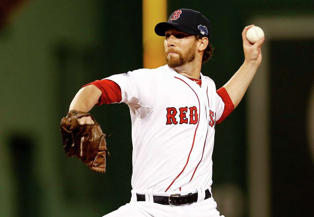Craig Breslow, a former Trumbull and Yale star, pitches for the Red Sox against the Tampa Bay Rays in the American League Division Series on Oct. 5, 2013, at Fenway Park in Boston.