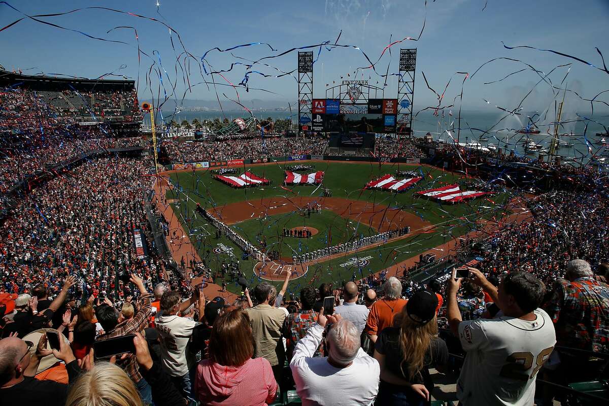 The playing of the national anthem during opening day before a baseball game between the San Francisco Giants and Seattle Mariners at AT&T Park, Tuesday, April 3, 2018, in San Francisco, Calif.